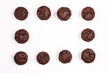 Chocolate muffins on white background