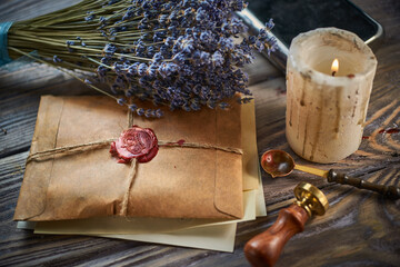 Sealing wax on ancient papers, antique stamp, and old documents, brass spoon 