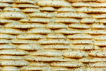 Texture of a brick wall with cracks and scratches which can be used as a background