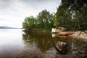 Shipwreck in Scottish loch Lomond on a summers morning 