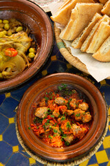 Morrocan local market on the streets with spices, nuts, fish, fruits and vegetables.