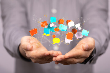 Hand holding using mobile phone with email icon on screen. Concept of business communication