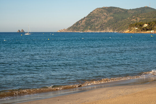 White sandy beach Les Sablettes in La Seyne-sur-mer in morning sunlights