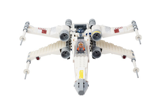 Lego Star Wars. Classic X-wing starfighter isolated on white background. Luke Skywalker. Front view.