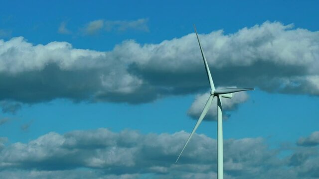 Wind Turbine clouds in sky