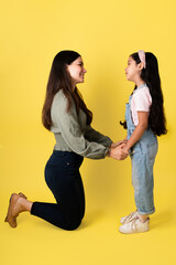 Mom telling her daughter she loves her