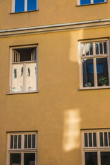 Stockholm, Sweden An orange house facade and windows on a building on Sodermalm.
