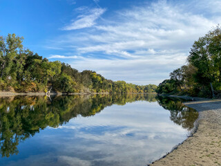 Cloud reflections on the American river