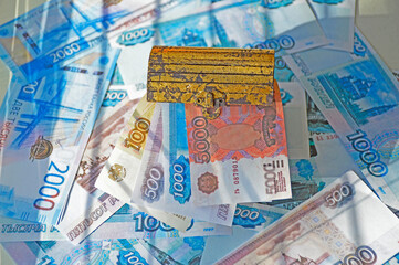Russian money. Close-up of Russian rubles of different denominations. The concept of finance, saving and saving money.