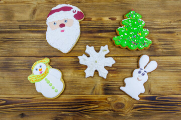 Christmas gingerbread cookies on a wooden table. Top view