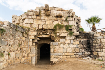 Ruins of a crumbling 16th-century Genoese castle in Sigacik, Izmir, Turkey.