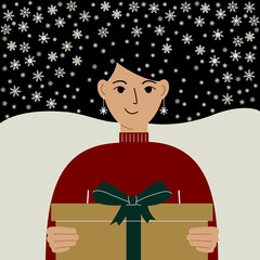 Christmas and New Year gift giving concept. Beautiful woman holding a gift box with a bow. Hair in snowflakes.