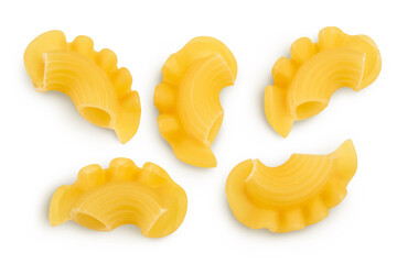 Pasta cornetti creste macaroni isolated on white background with clipping path and full depth of field. Top view. Flat lay