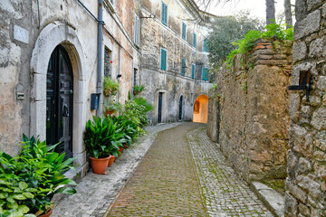 A narrow street of Castro dei Volsci in medieval town of Lazio region, Italy.