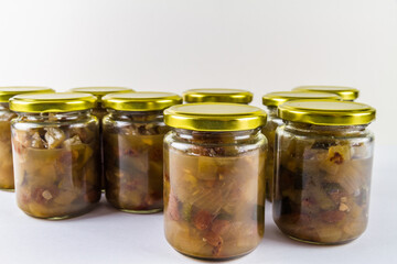 Batch of home made marrow chutney jars, landscape.