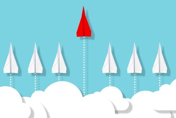 Fototapeta premium Single red paper plane emerges from group of white paper planes on blue background with clouds, business concept for leadership, new ideas, innovation or creativity