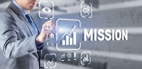 Businessman clicks on virtual screen Mission