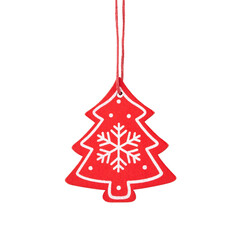 Hanging red wooden Christmas tree ornament with snowflake isolated on a white background.