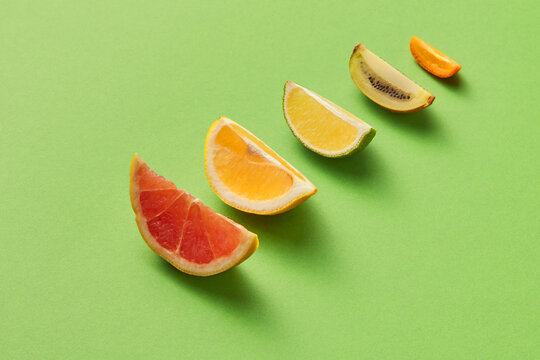 Different citrus fruits and kiwi