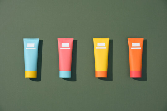 colorful tubes of bathroom amenity contains