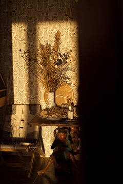 Sun reflection on a wall with rustic decor
