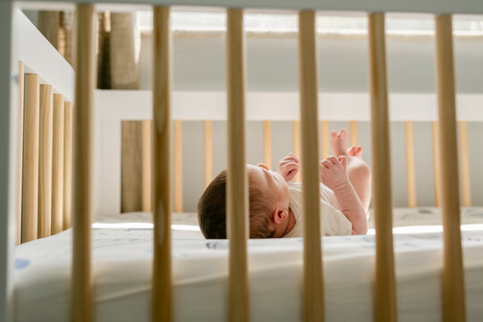 Baby alone in his crib