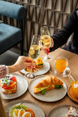 women drinking champagne in cafe