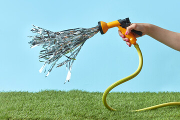 Woman with watering hose