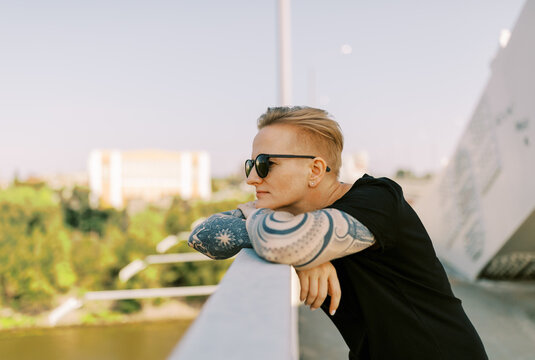 Lesbian Woman with sunglasses outdoors