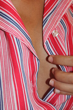 Unbuttoning shirt