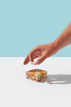 Man making bubble gums stack