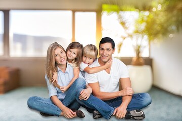 Family with the little child resting in living room