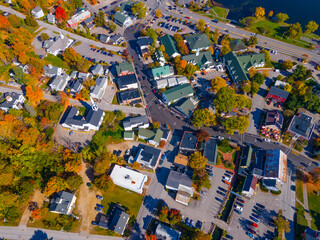Meredith town center with fall foliage top view including First Congregational Church and Mill Falls, New Hampshire NH, USA. 