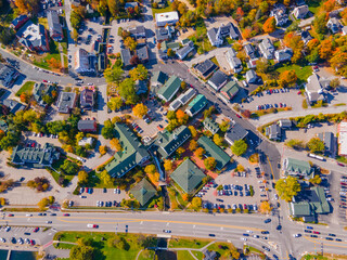 Fototapeta premium Meredith town center with fall foliage top view including First Congregational Church and Mill Falls, New Hampshire NH, USA. 