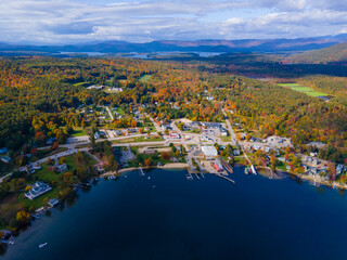 Center Harbor town center aerial view in fall with waterfront of Lake Winnipesaukee, New Hampshire NH, USA. 