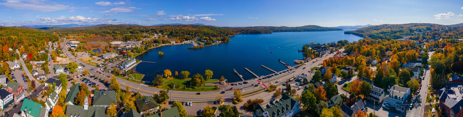 Panoramic aerial view of Meredith Bay in Lake Winnipesaukee and Meredith town center in fall, New...