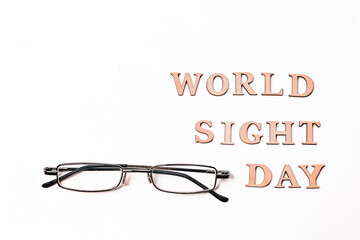 World Sight Day on 10th October. Copy Space. Glasses for improving vision. Flat lay. Top view.