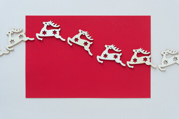 christmas ornament set - reindeers floating on red