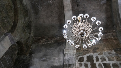 old vintage chandelier with candles. antique chandelier in the castle