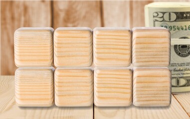 Set of money banknote on wooden blocks on the desk