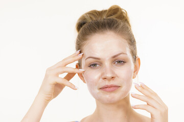 Fototapeta premium Girl with cream moisture cosmetic on face