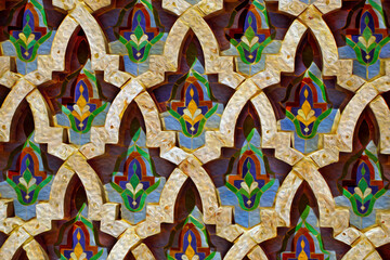 Wall ornate with exquisite and complex arabesques at the Hassan II mosque in Casablanca. The economic and business center of Morocco. Oil paint filter