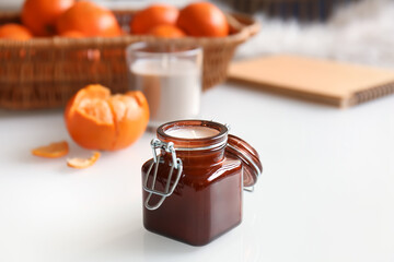 Aroma candle in jar on table in room