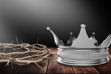 A Kings Crown and the wooden Crown of Thorns on the desk