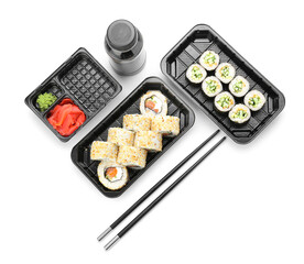 Composition with delicious sushi rolls on white background