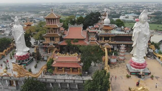 Dong Nai, Vietnam - the ancient architectural pagoda with beautiful statues depicting religious spiritual culture in Dong Nai, Vietnam. (aerial photography)