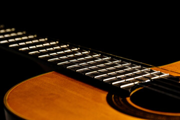Fototapeta premium Close-up guitar in black backdrop