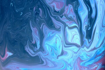 Abstract blue marble background. The lines and waves of acrylic paint create an interesting structure. Background for web design, fabric, design, laptop case.