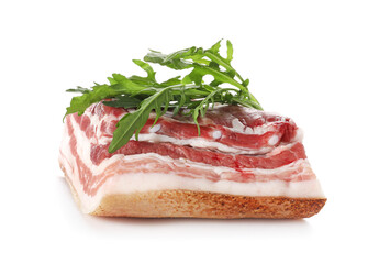 Uncooked bacon with arugula on white background