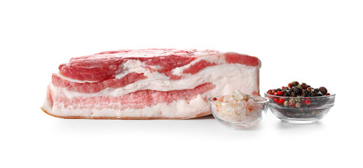 Uncooked bacon with spices on white background
